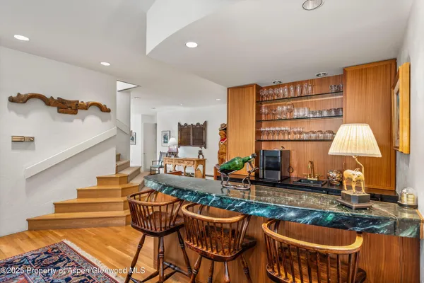 a view of a room with a large window