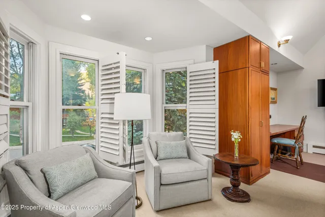 a view of a porch with a chairs