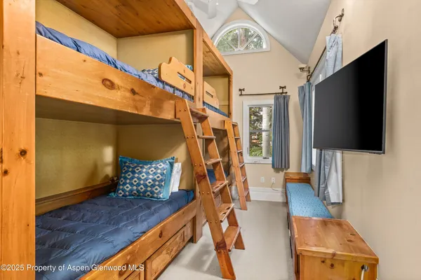 a view of an entryway with wooden floor and door