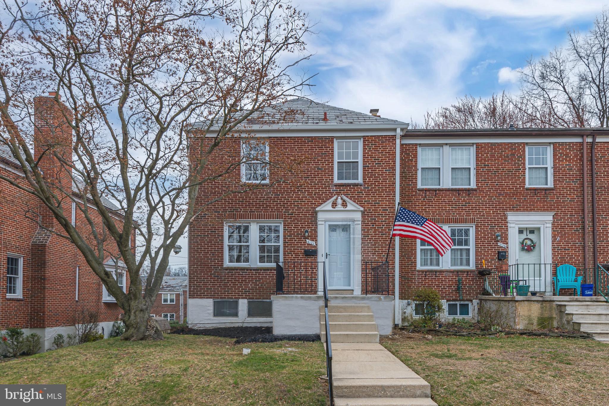6121 Regent Park Road Baltimore, MD 21228 - Photo 1 of 36 a front view of a house with garden