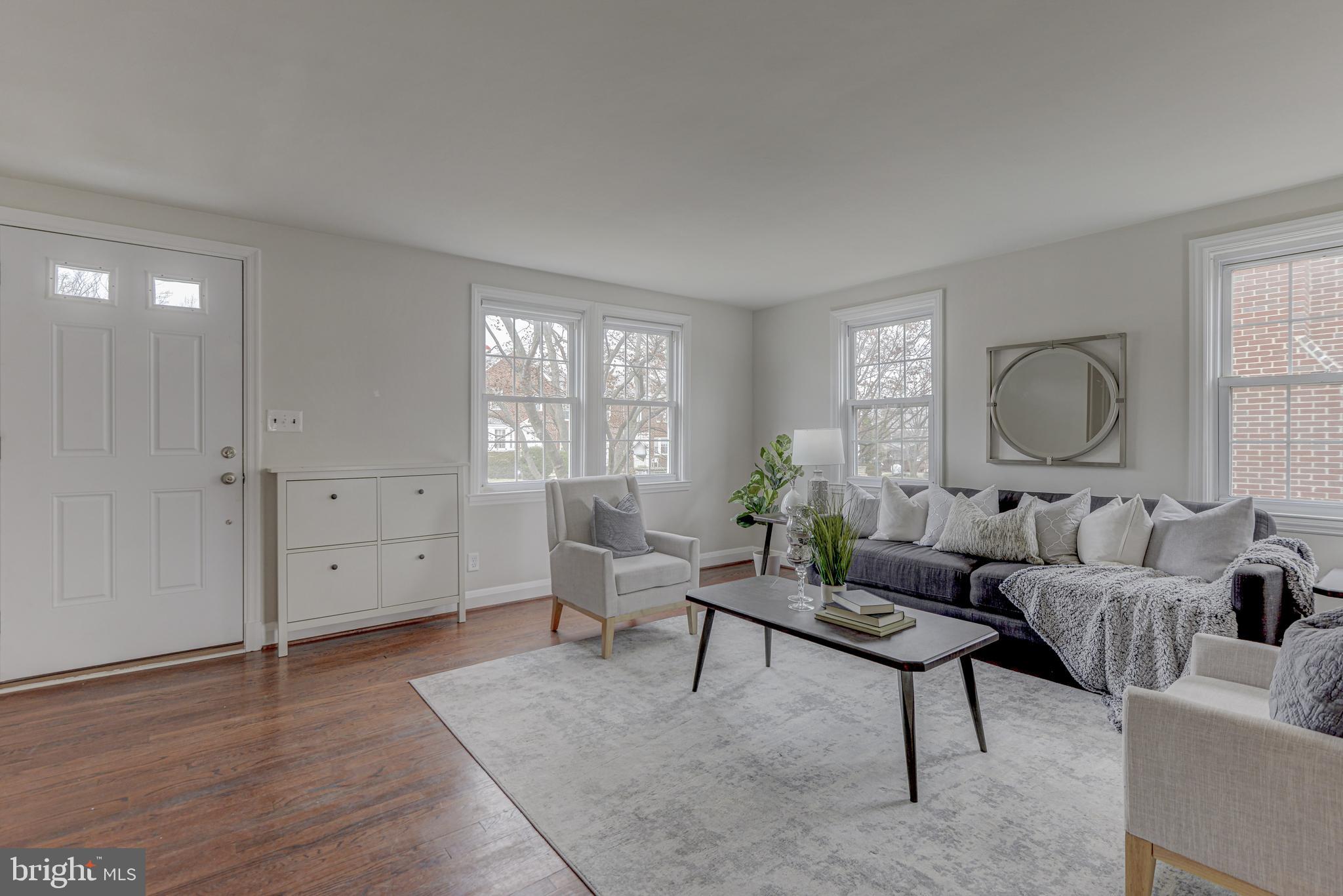 6121 Regent Park Road Baltimore, MD 21228 - Photo 3 of 36 a living room with furniture and a window