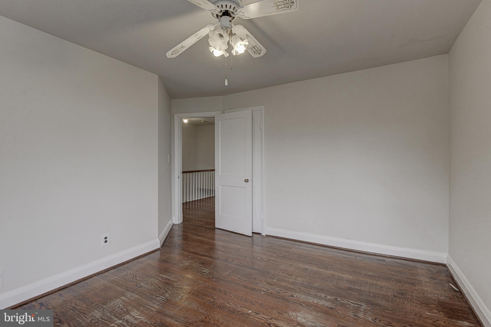6121 Regent Park Road Baltimore, MD 21228 - Photo 27 of 36 wooden floor in an empty room