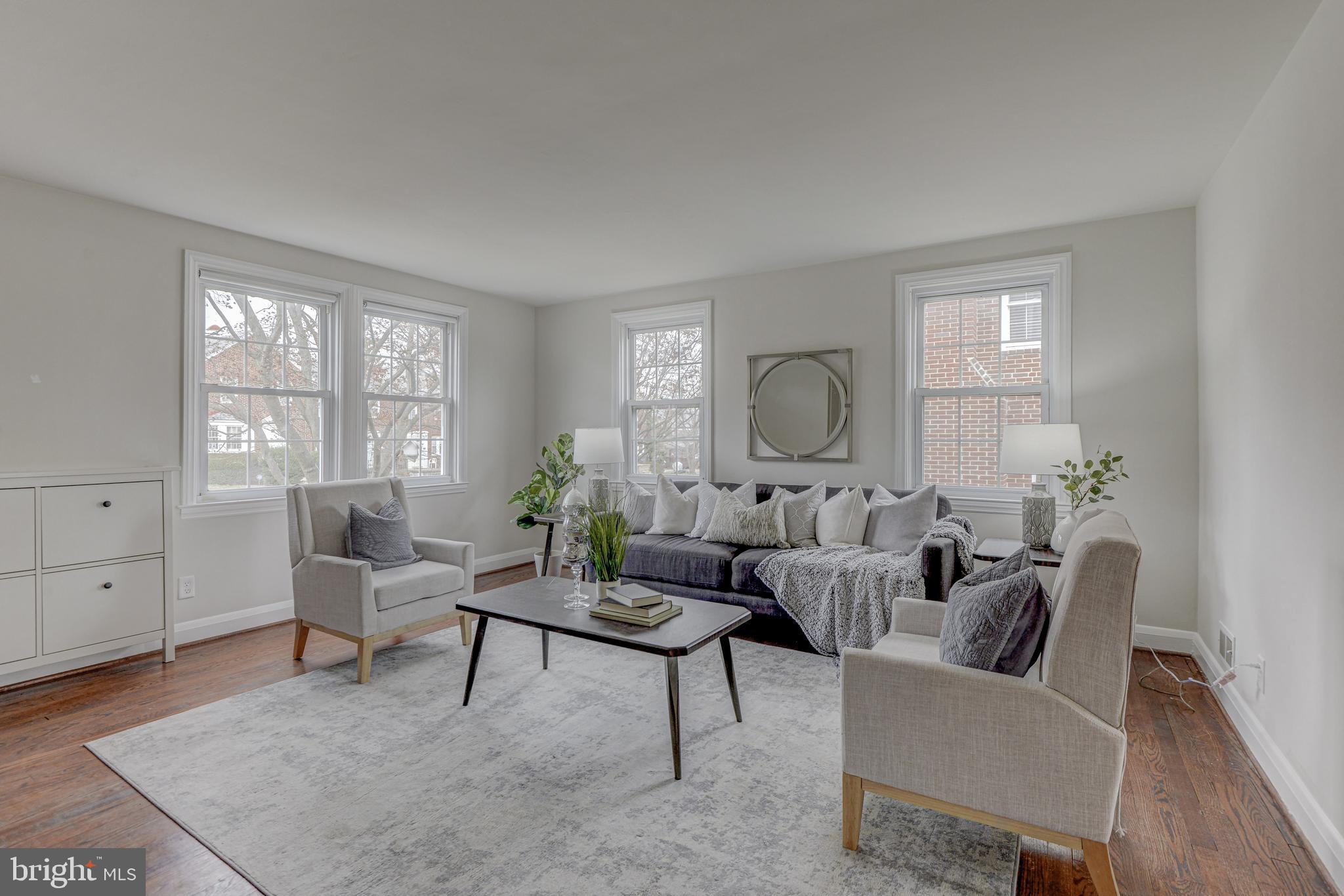 6121 Regent Park Road Baltimore, MD 21228 - Photo 4 of 36 a living room with furniture and a large window