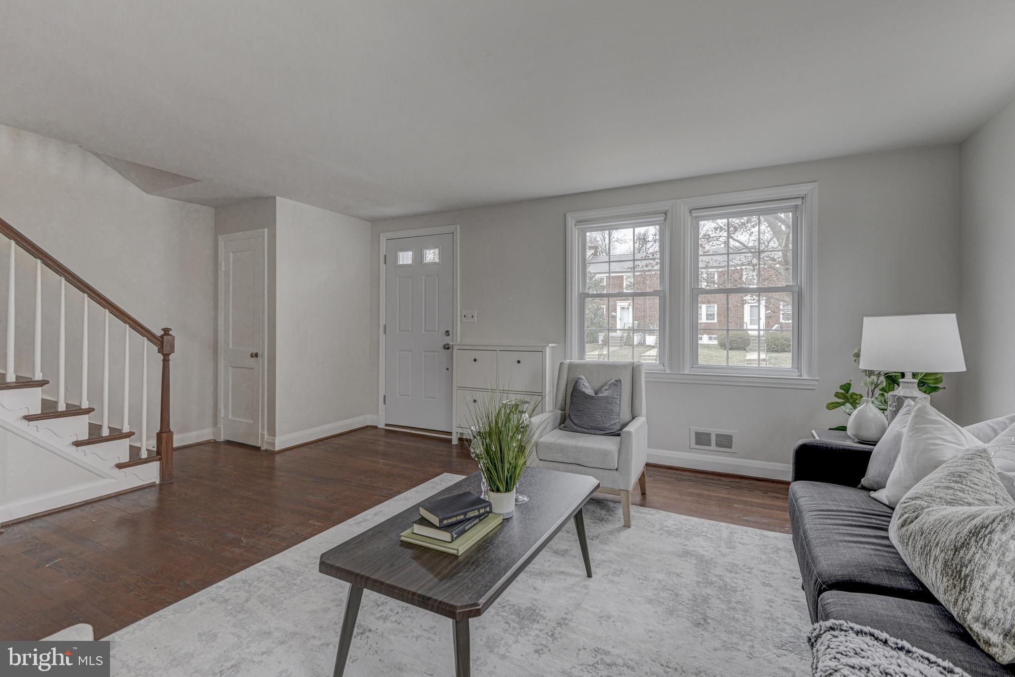 6121 Regent Park Road Baltimore, MD 21228 - Photo 6 of 36 a living room with furniture and wooden floor