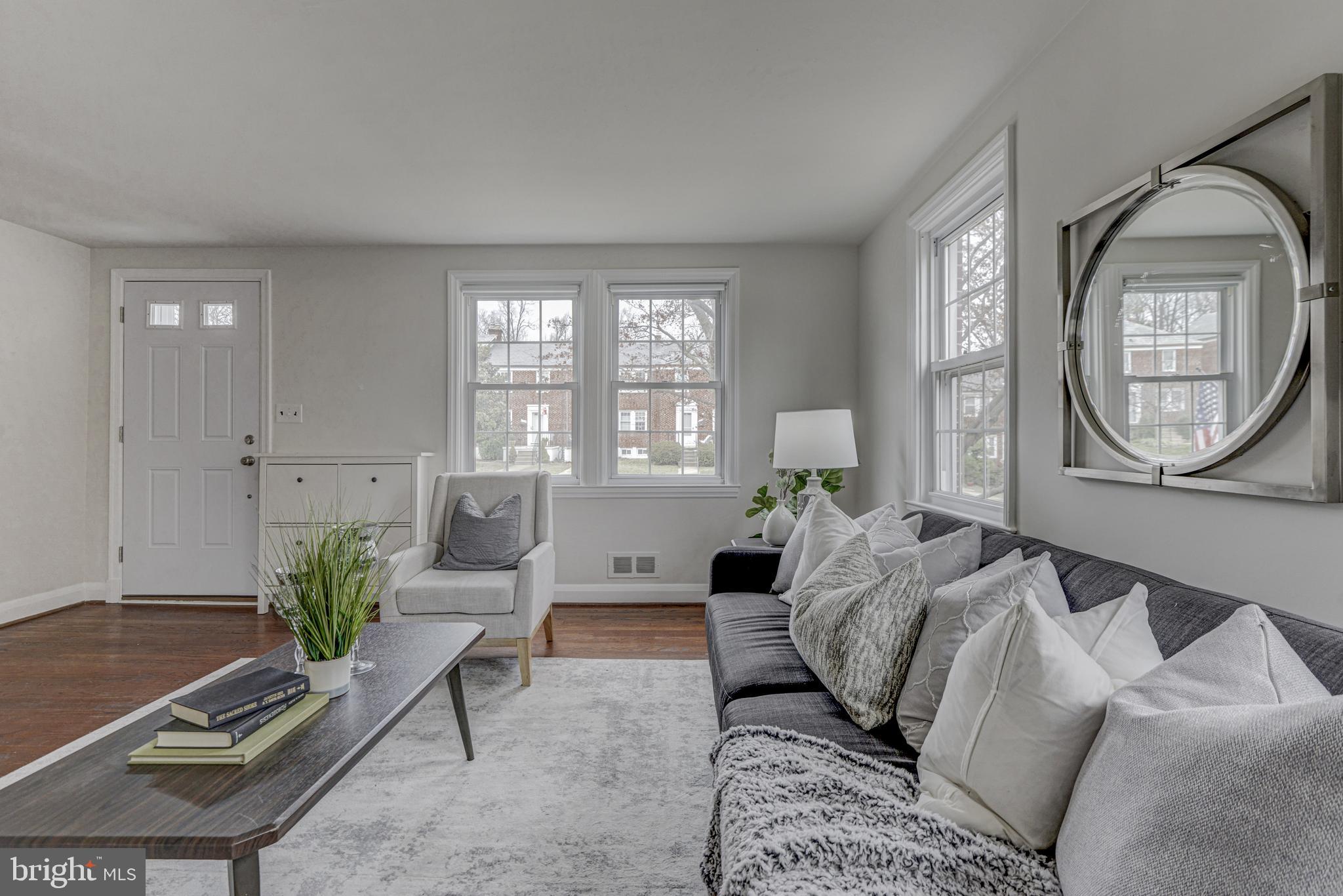 6121 Regent Park Road Baltimore, MD 21228 - Photo 7 of 36 a living room with furniture and a window