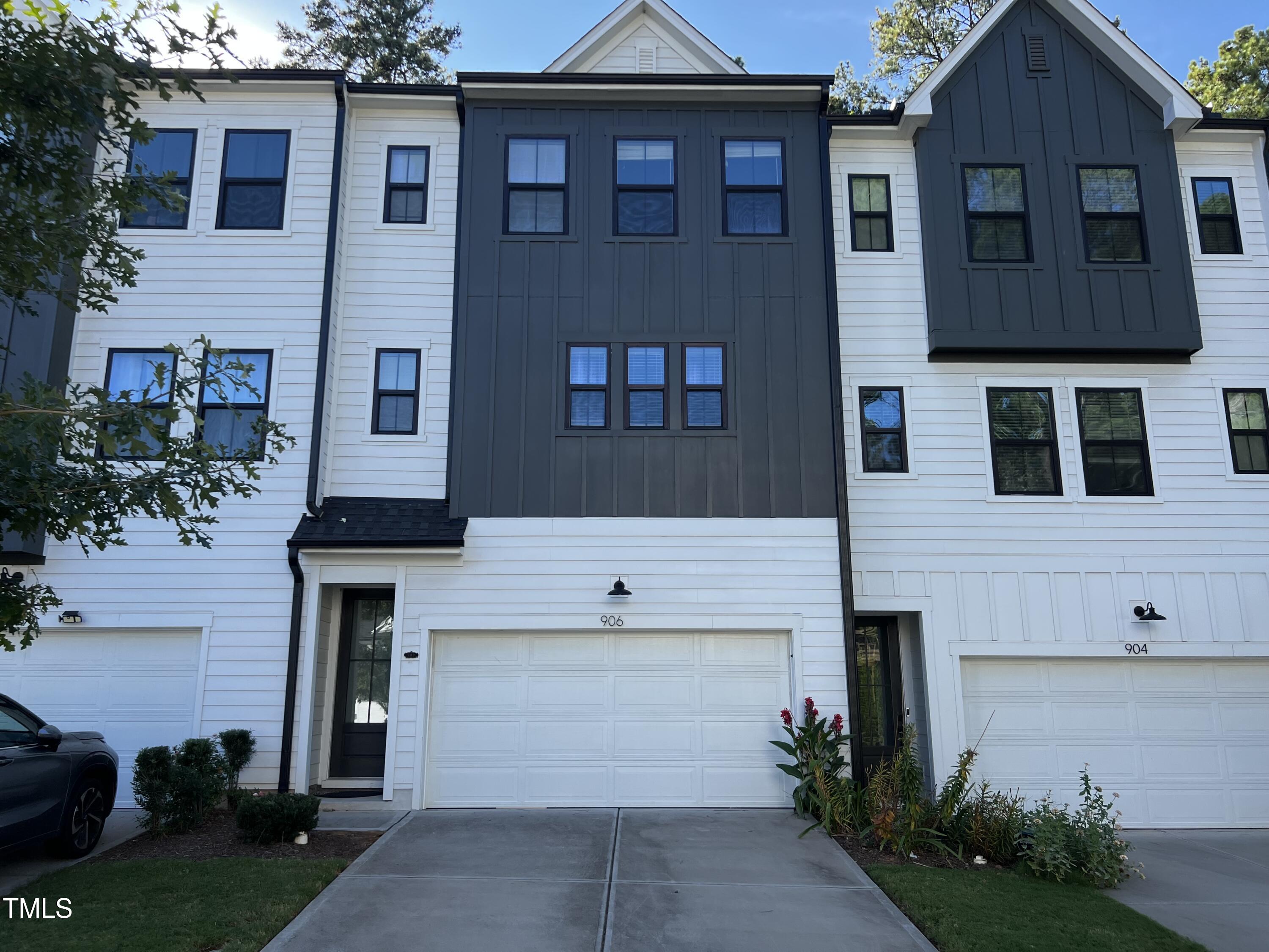 906 Waterside View Drive Raleigh, NC 27606 - Photo 1 of 27 a front view of a house with garden