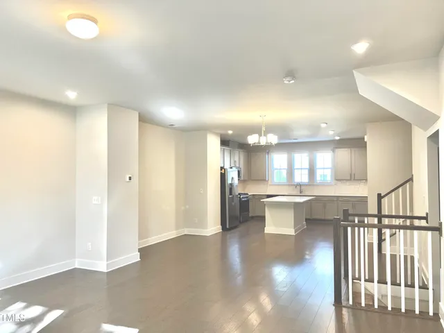 a view of a lobby with black carpet