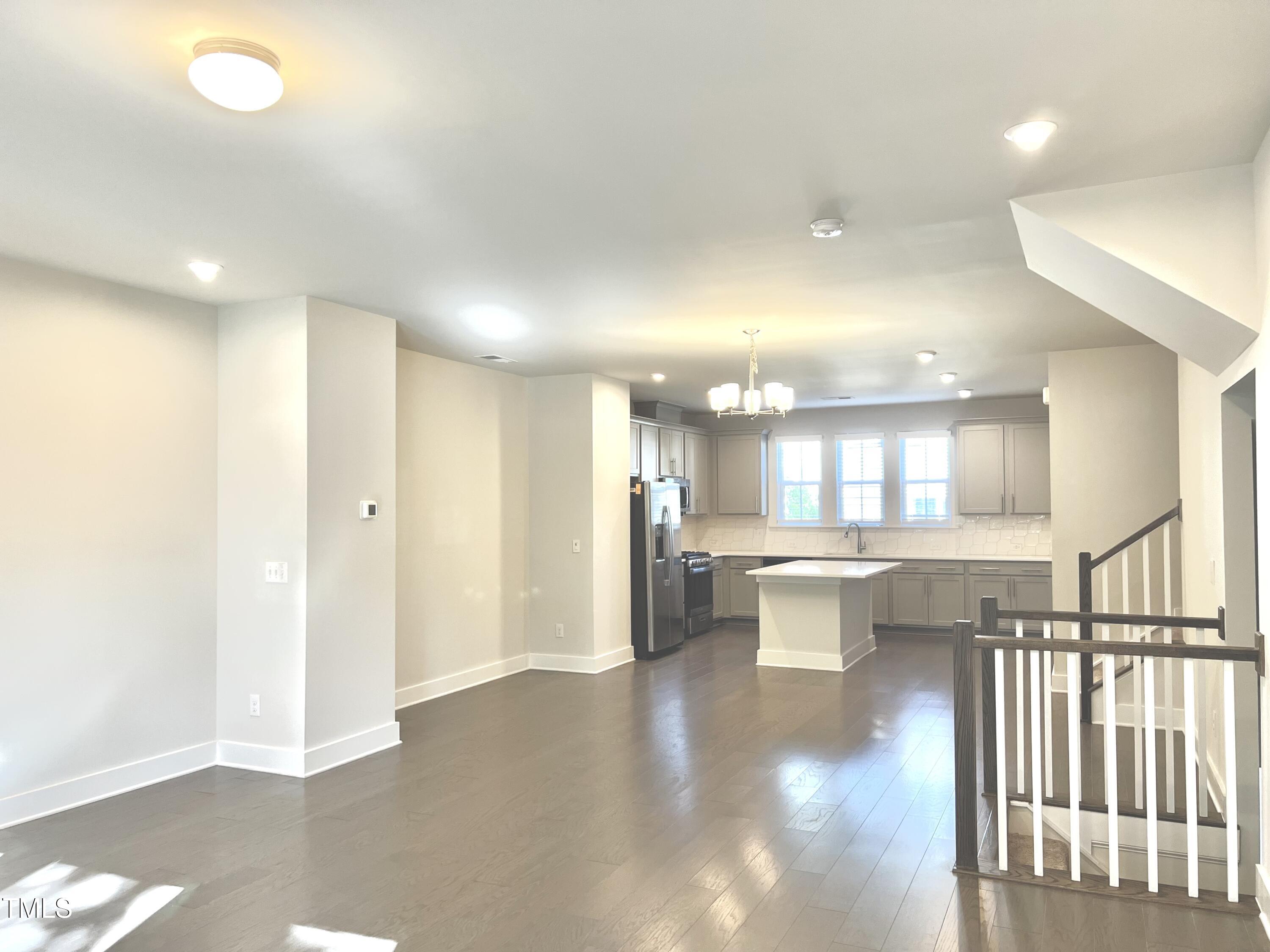 906 Waterside View Drive Raleigh, NC 27606 - Photo 4 of 27 a view of a kitchen and dining room