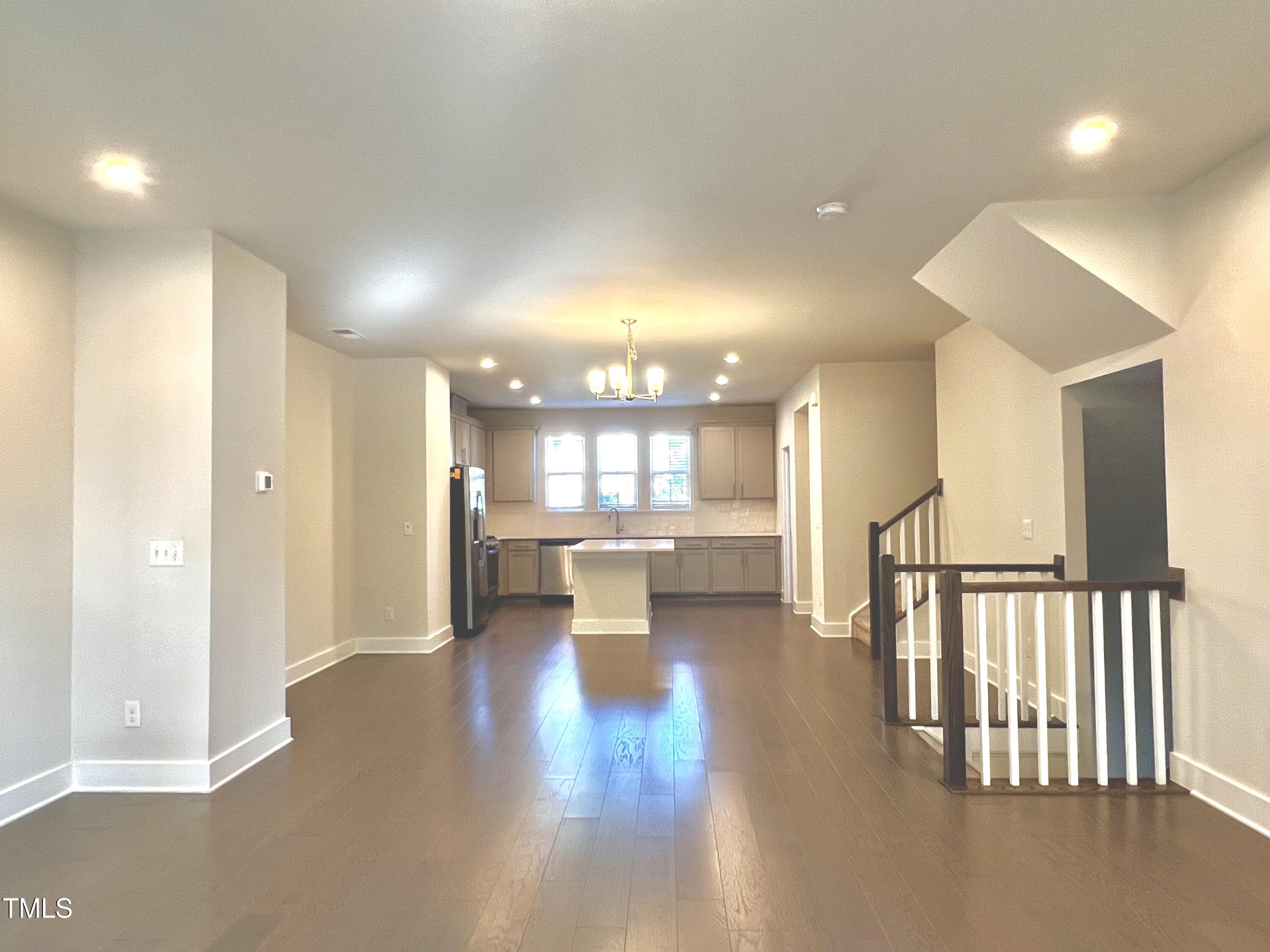 906 Waterside View Drive Raleigh, NC 27606 - Photo 5 of 27 a view of a lobby with black carpet
