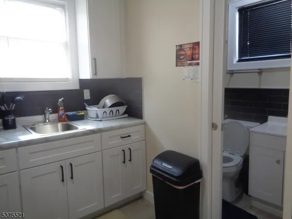 a room with storage and utility