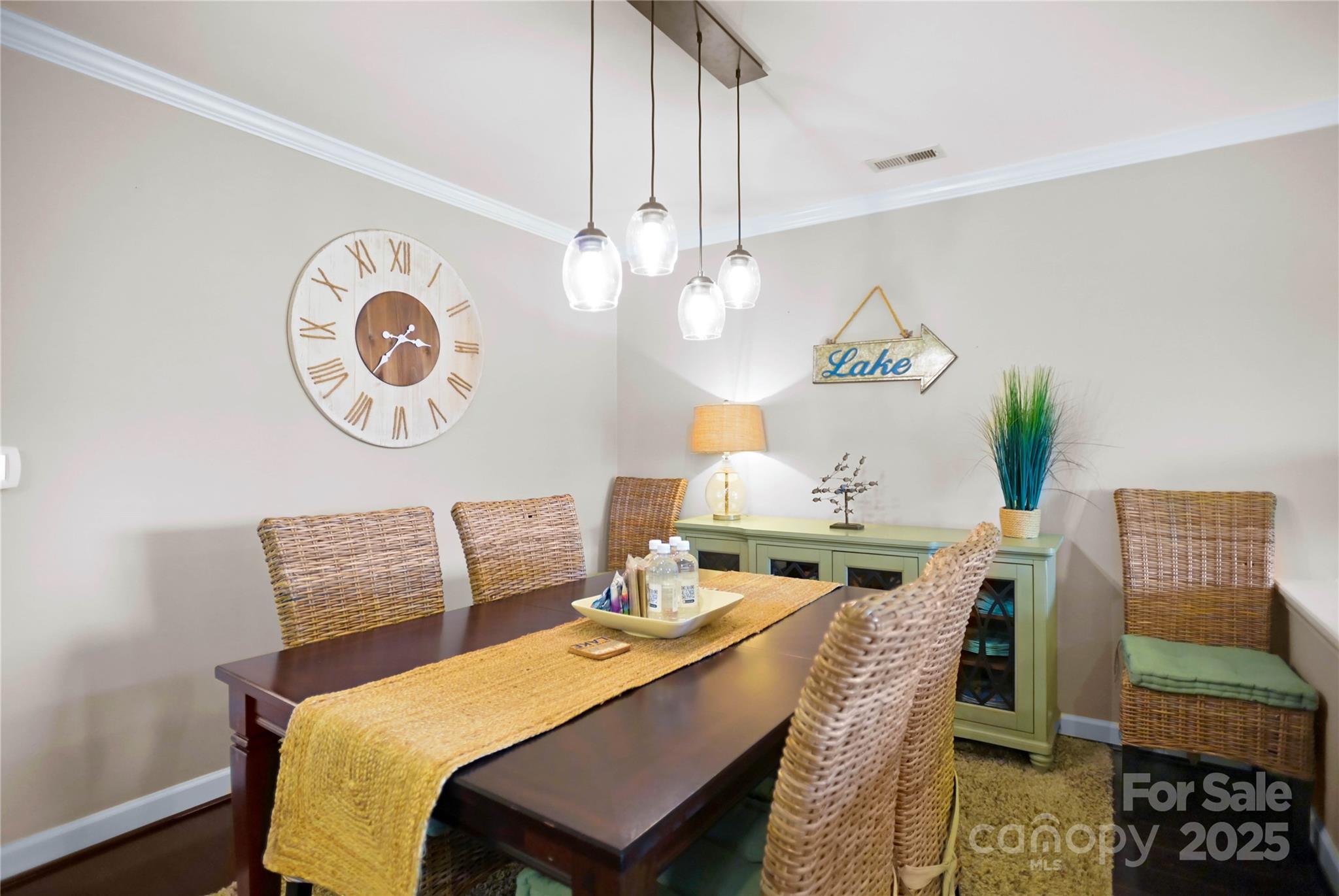 18525 Harborside Drive Cornelius, NC 28031 - Photo 13 of 32 a view of a dining room with furniture and wooden floor