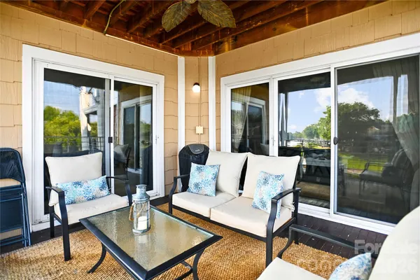 a view of a lake with sitting area