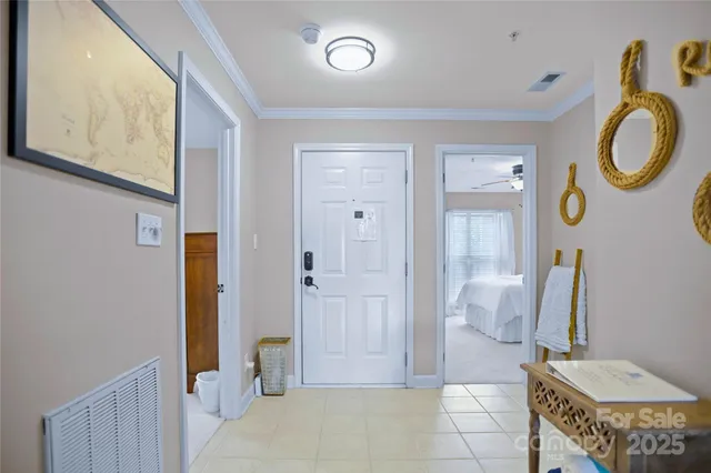 a bathroom with a granite countertop shower a mirror and a sink