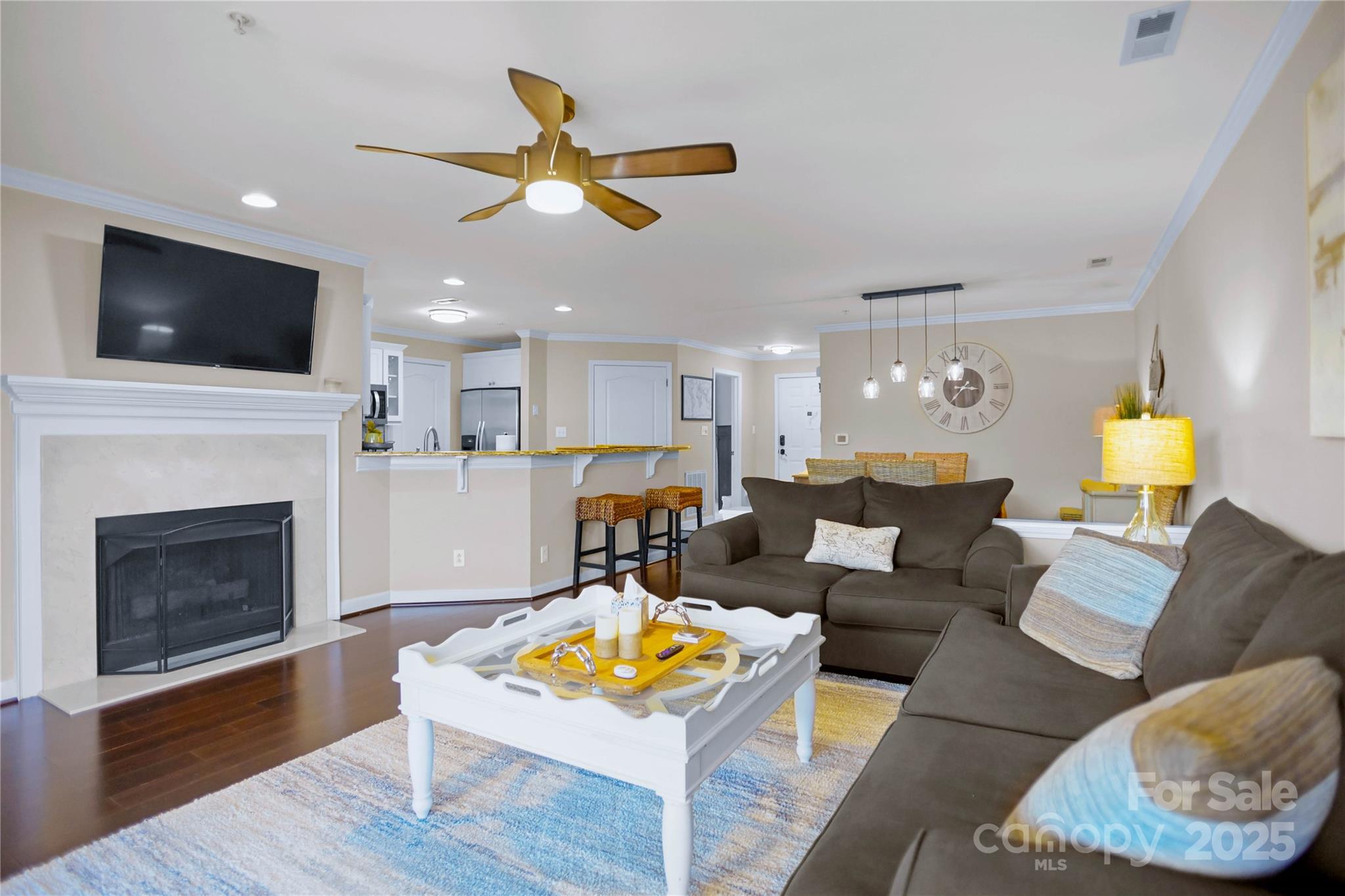 18525 Harborside Drive Cornelius, NC 28031 - Photo 7 of 32 a living room with furniture fireplace and flat screen tv