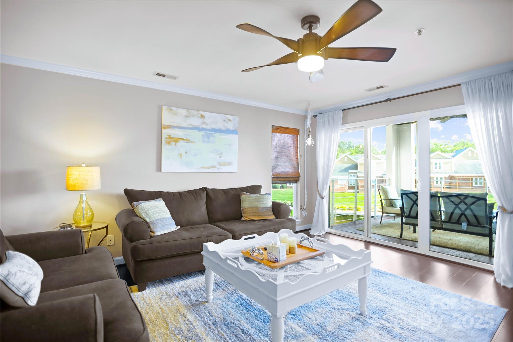 18525 Harborside Drive Cornelius, NC 28031 - Photo 8 of 32 a living room with furniture and a large window