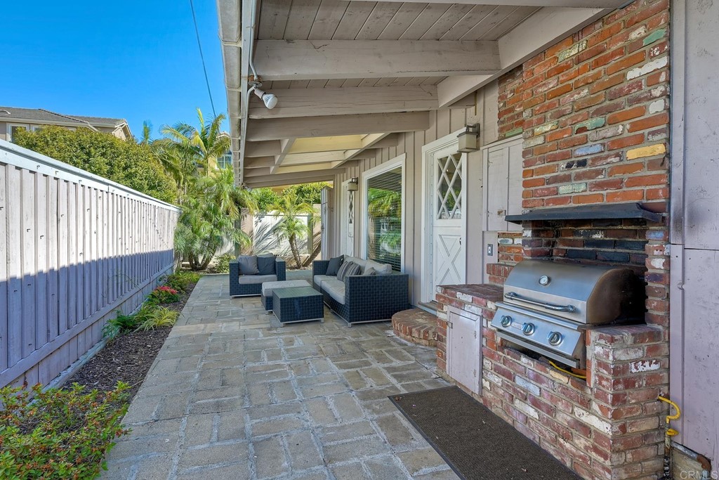 367 Beech Avenue Carlsbad, CA 92008 - Photo 11 of 23 a balcony with furniture and a potted plant