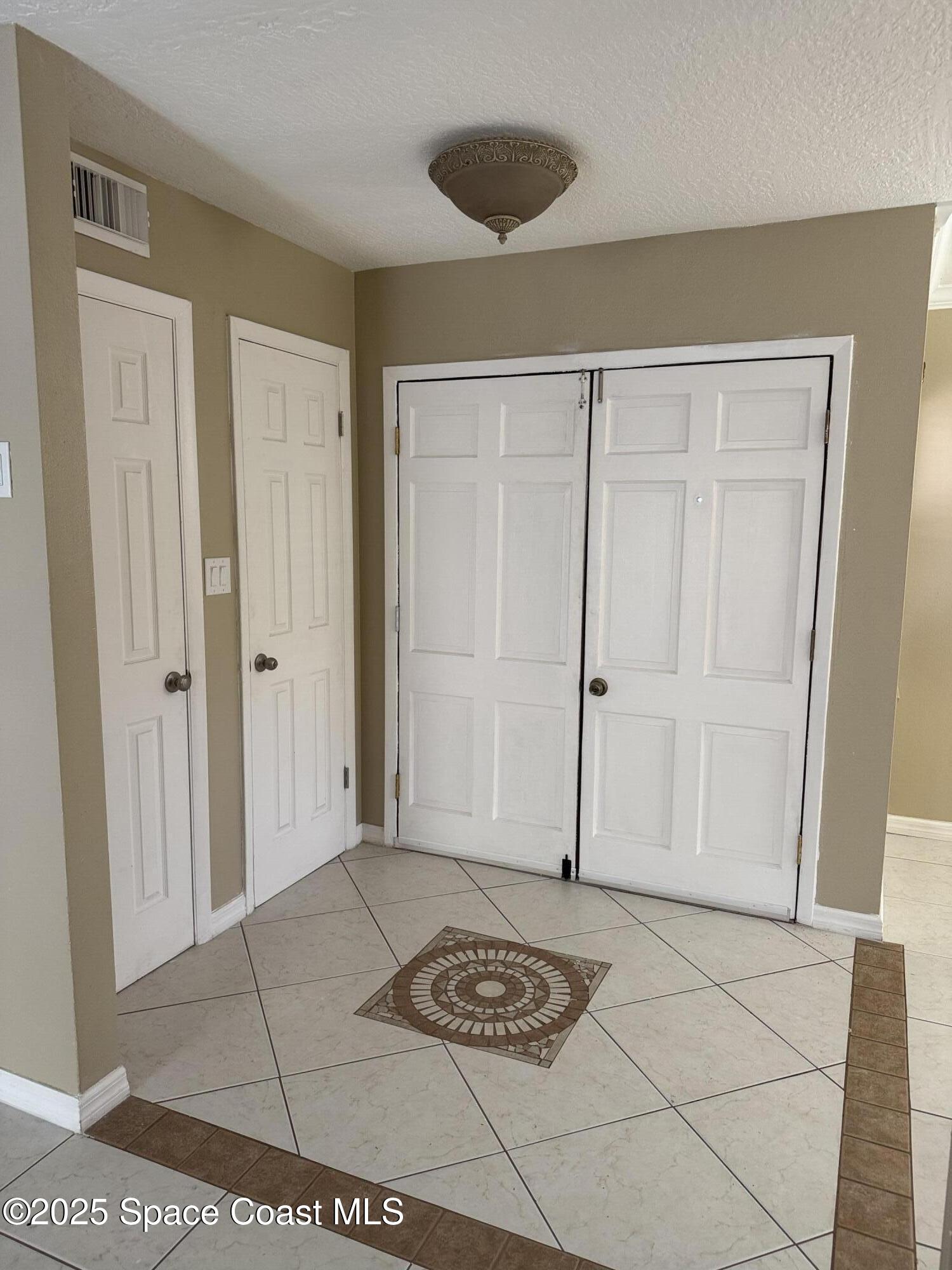 997 Beacon Road Rockledge, FL 32955 - Photo 3 of 18 a view of a entryway door of the house