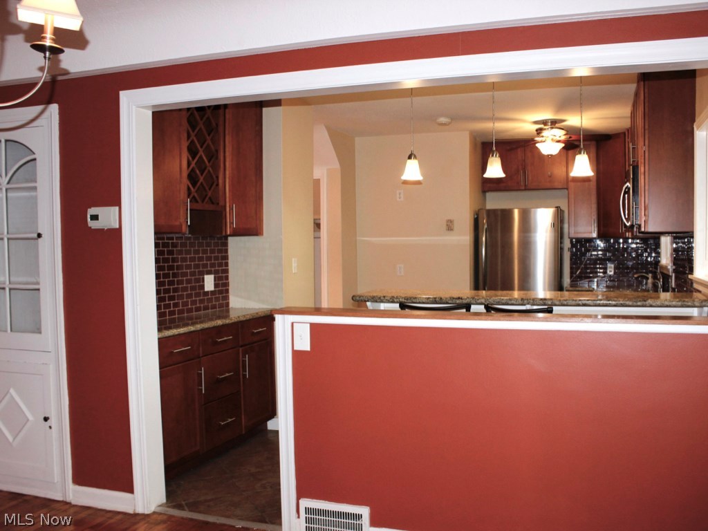 2187 Edgerton Road Cleveland, OH 44118 - Photo 5 of 14 DINING ROOM VIEW INTO KITCHEN.