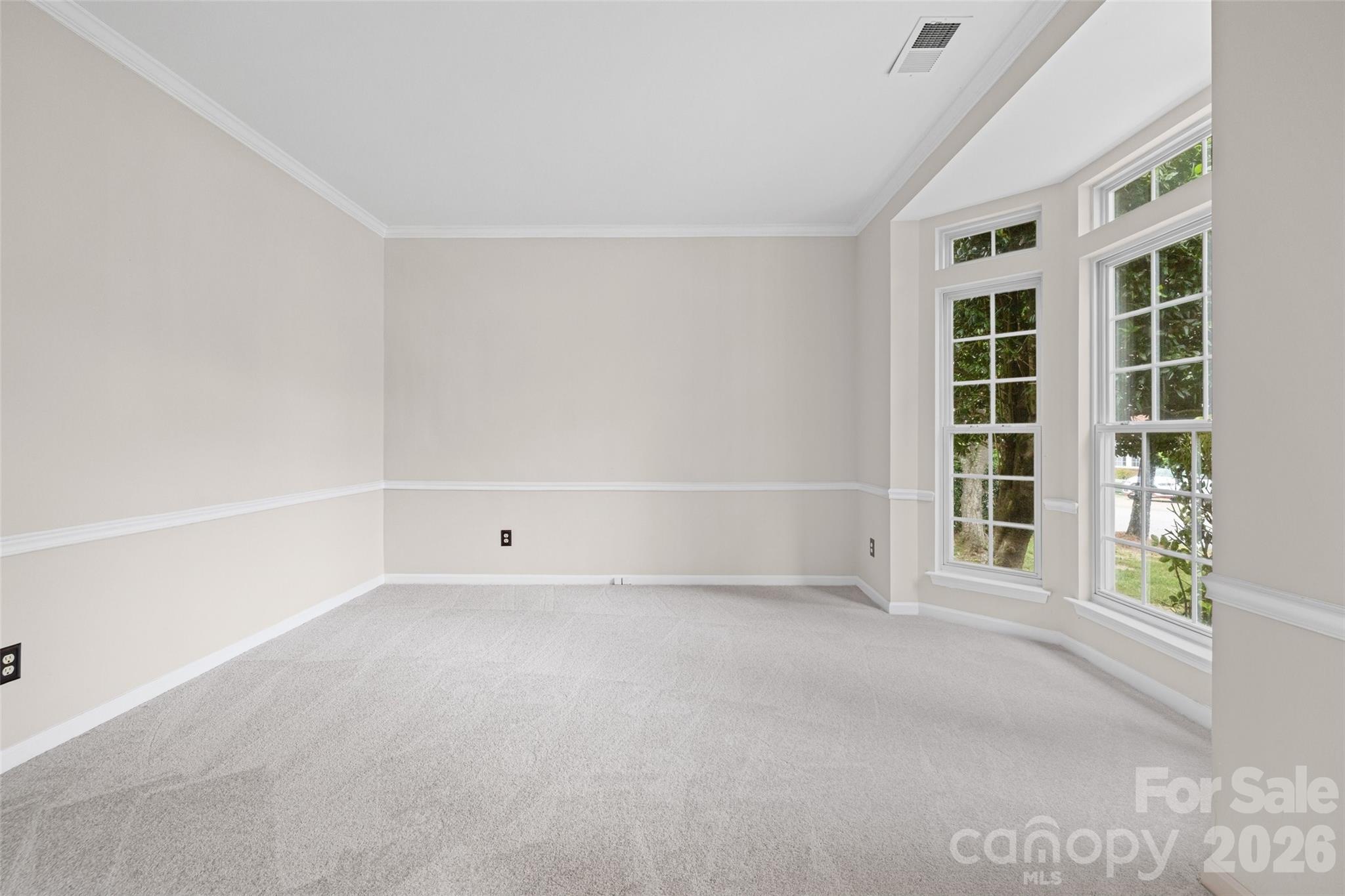 620 East Cheval Drive Fort Mill, SC 29708 - Photo 6 of 48 a view of an empty room with a window