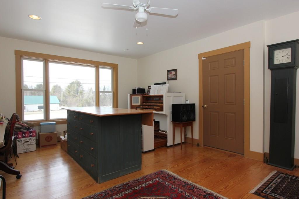 134 Mountain View Road Thorndike, ME 04986 - Photo 20 of 34 Sunroom. The workbench is not...
