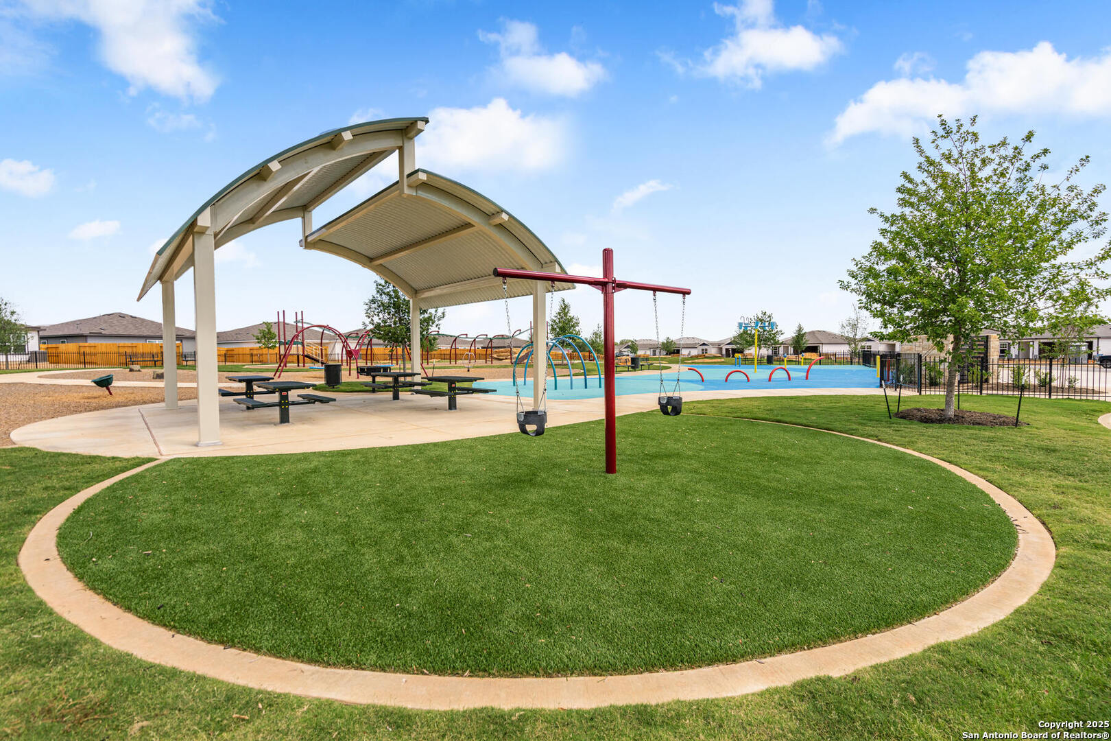 16036 Stratford Cove Lytle, TX 78052 - Photo 17 of 28 a view of a park with swings