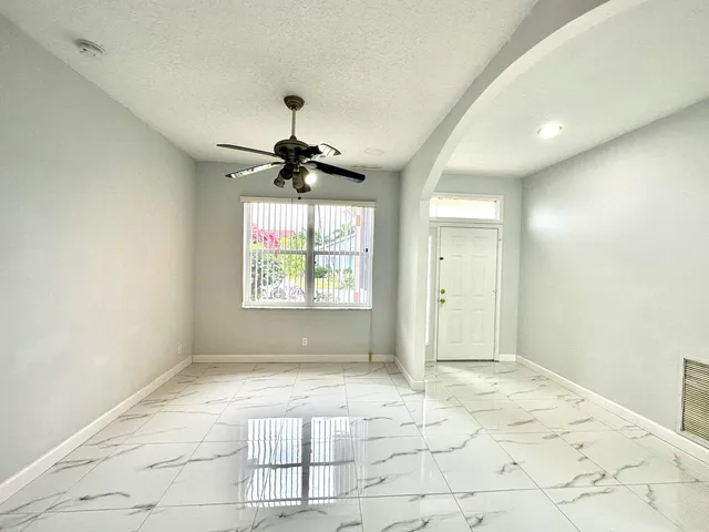a bathroom with a bathtub and a toilet