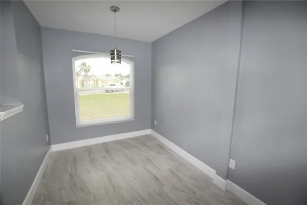 a view of an empty room with window