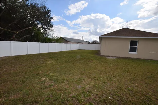 a view of an outdoor space and a yard