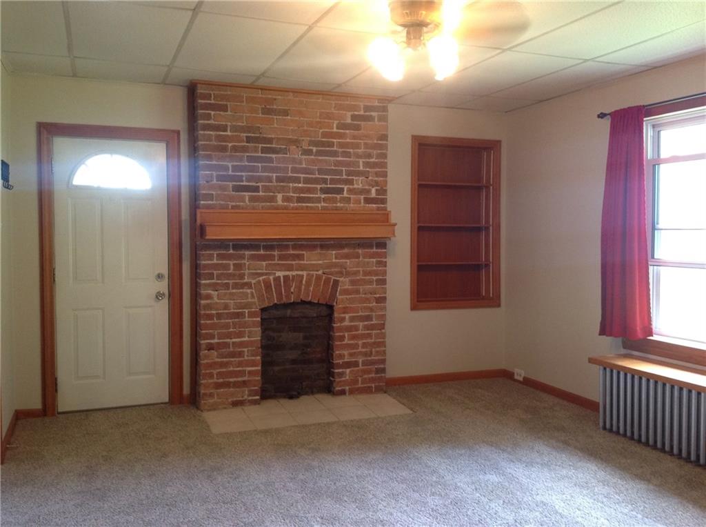 602 Friday Road Pittsburgh, PA 15209 - Photo 3 of 25 Living Room with deco fireplace and built in shelves.