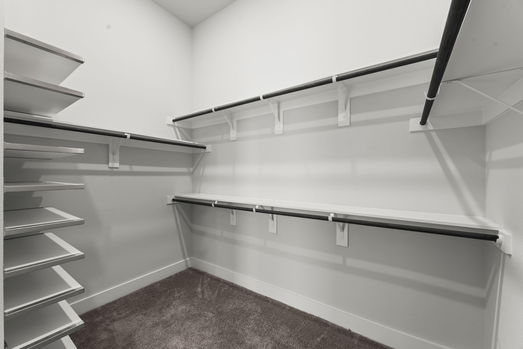 17151 Sandstone Street Conroe, TX 77302 - Photo 24 of 38 a view of an empty walk in closet