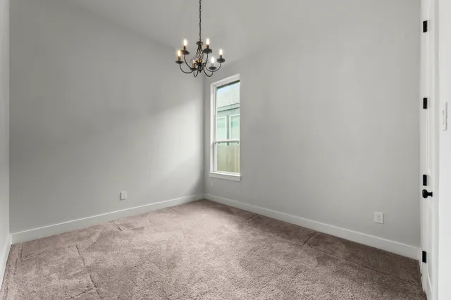 a view of an empty room with window
