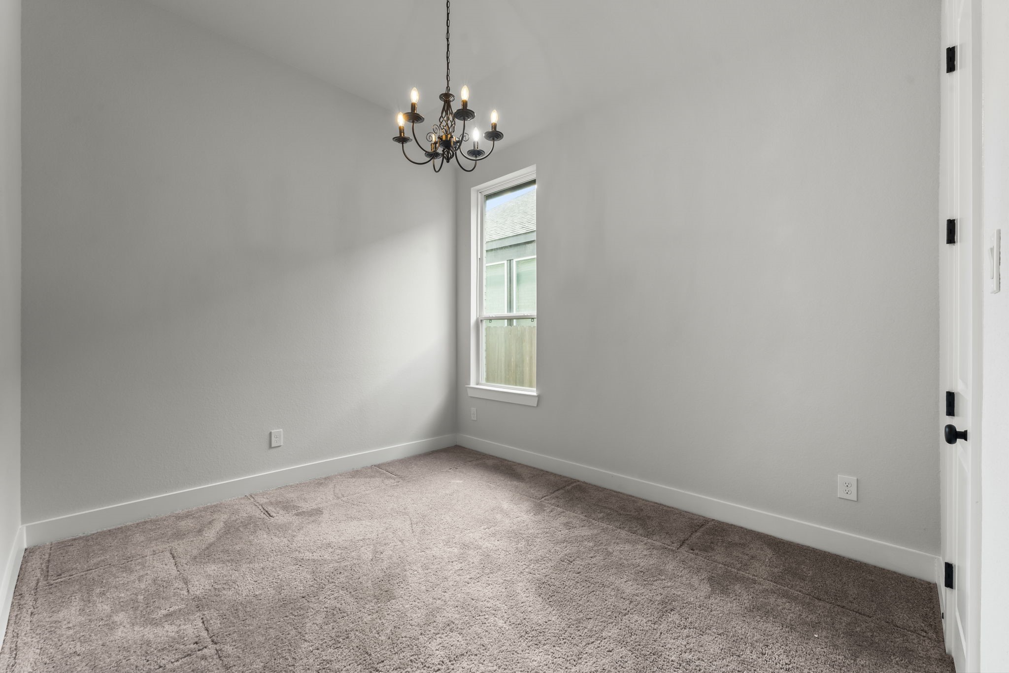 17151 Sandstone Street Conroe, TX 77302 - Photo 27 of 38 a view of an empty room with window