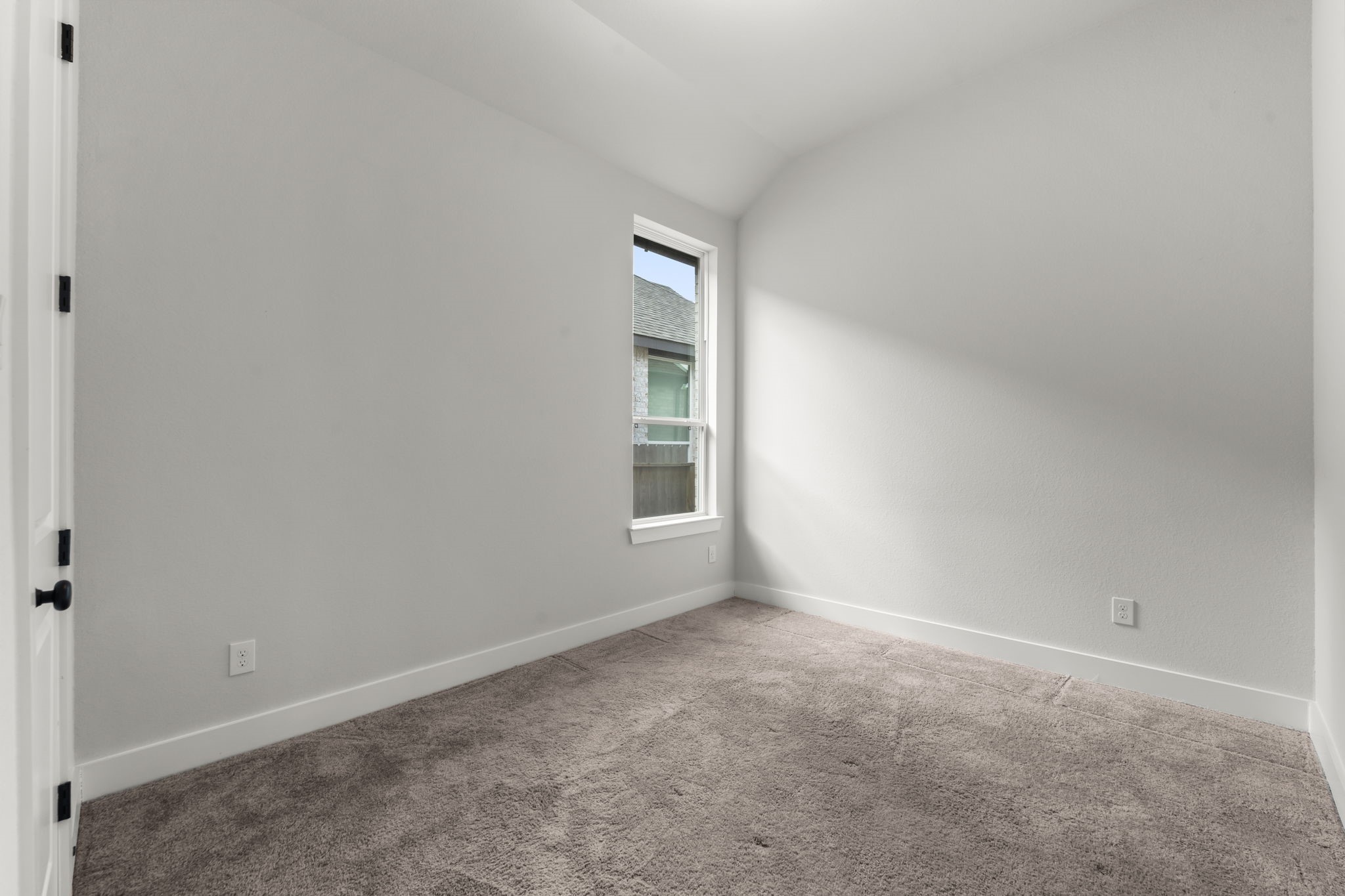 17151 Sandstone Street Conroe, TX 77302 - Photo 28 of 38 a view of an empty room with a window