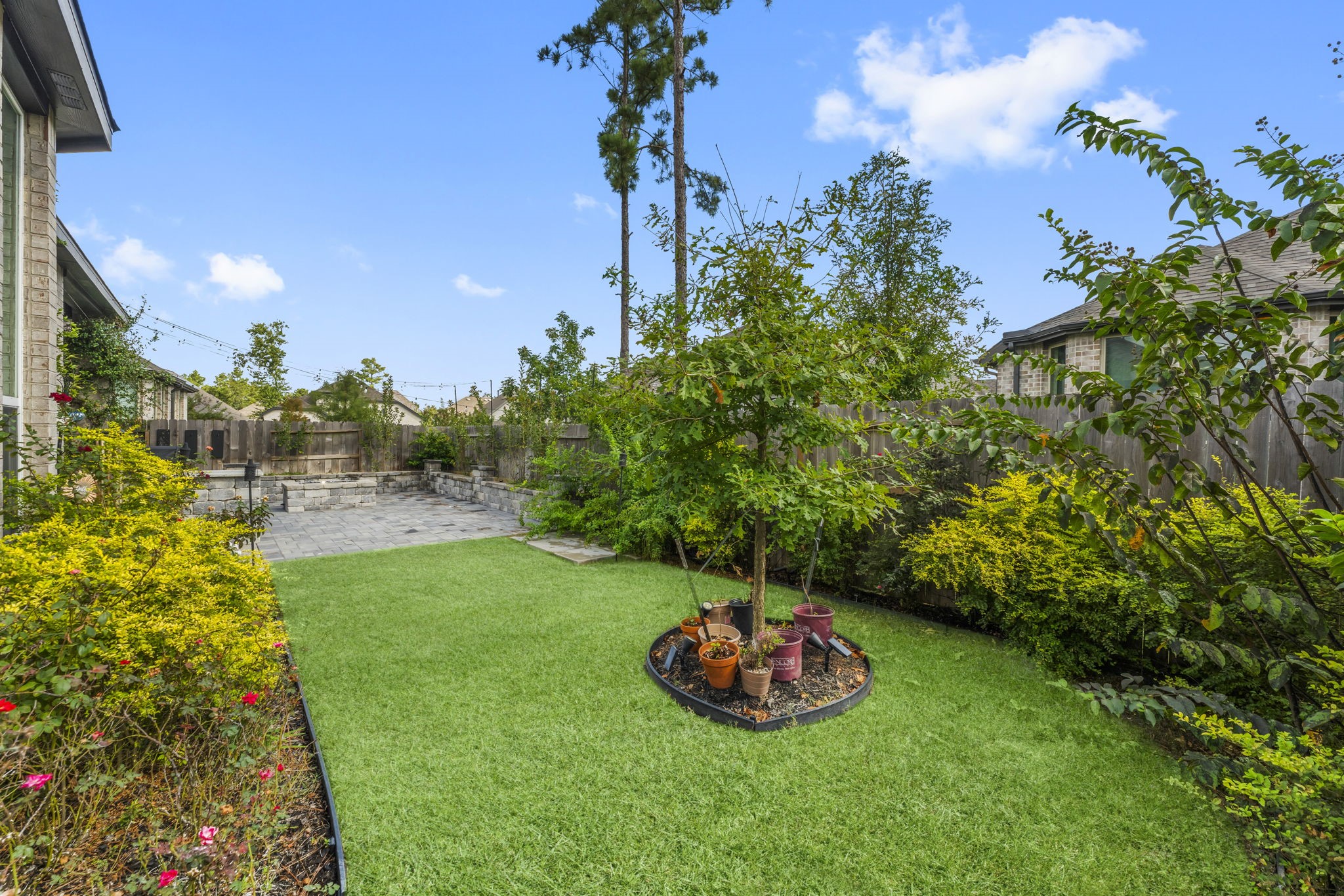 17151 Sandstone Street Conroe, TX 77302 - Photo 37 of 38 a view of an outdoor space and a yard