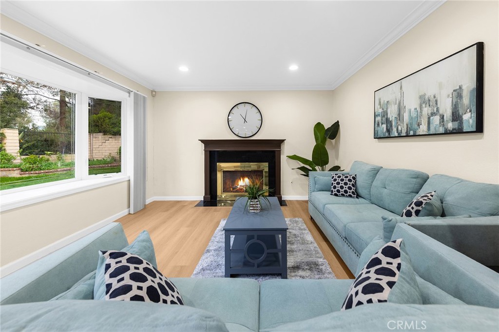 20329 Rim Ridge Road Walnut, CA 91789 - Photo 15 of 46 a living room with furniture a window and a fireplace