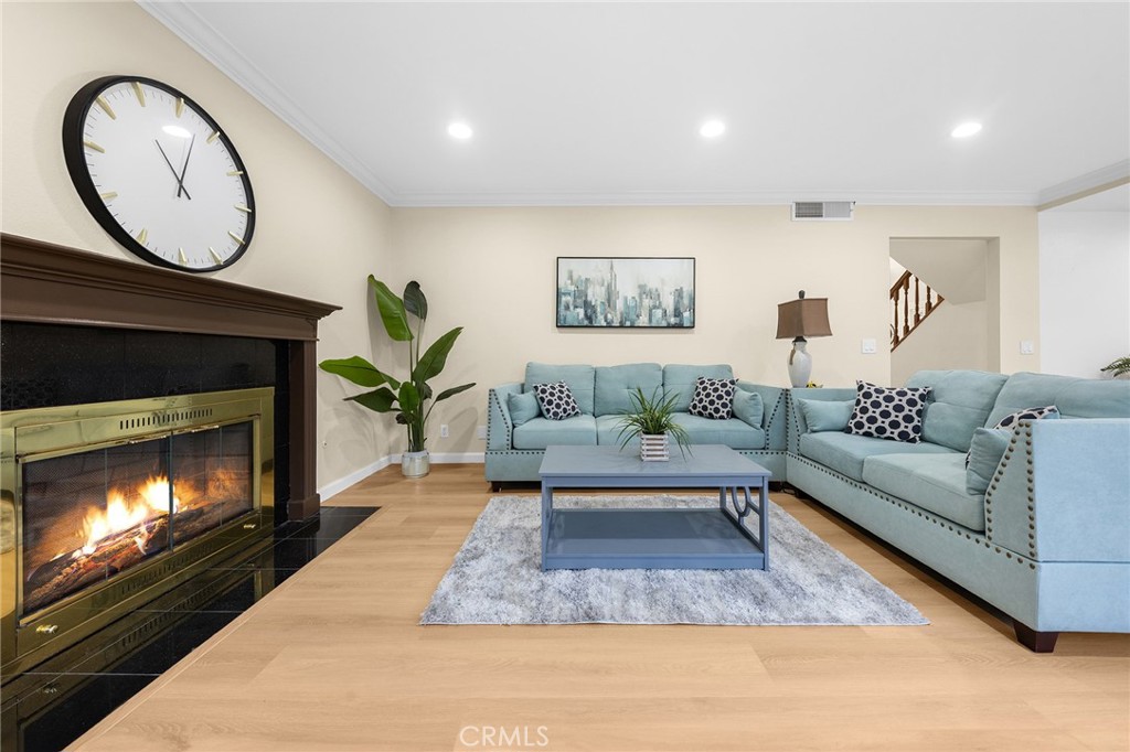 20329 Rim Ridge Road Walnut, CA 91789 - Photo 16 of 46 a living room with furniture a fireplace and a fireplace