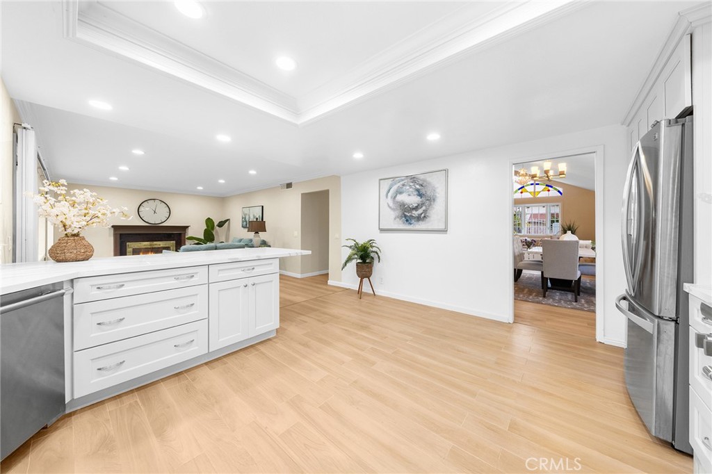 20329 Rim Ridge Road Walnut, CA 91789 - Photo 21 of 46 a hall with a lot of cabinet and a large mirror