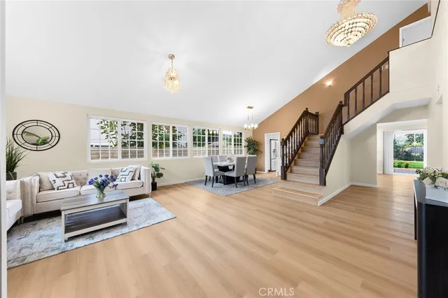 a living room with furniture and a table