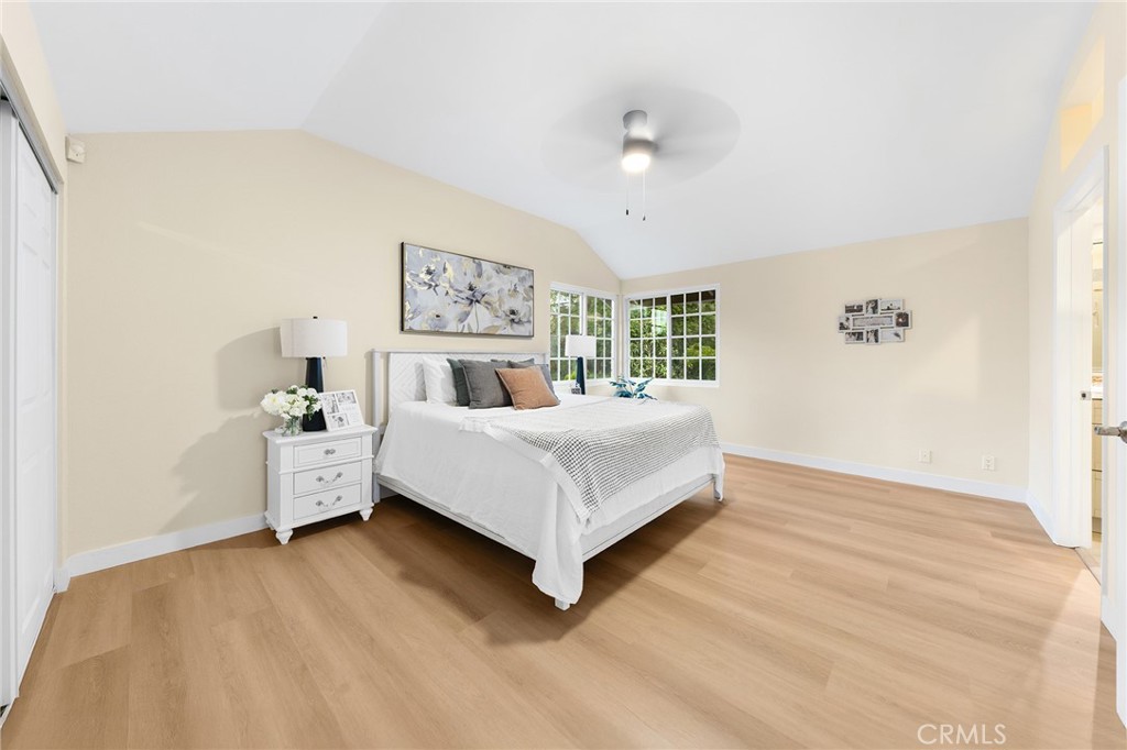 20329 Rim Ridge Road Walnut, CA 91789 - Photo 32 of 46 a bedroom with a bed and a night stand