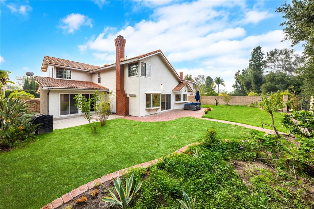 20329 Rim Ridge Road Walnut, CA 91789 - Photo 40 of 46 a front view of a house with garden
