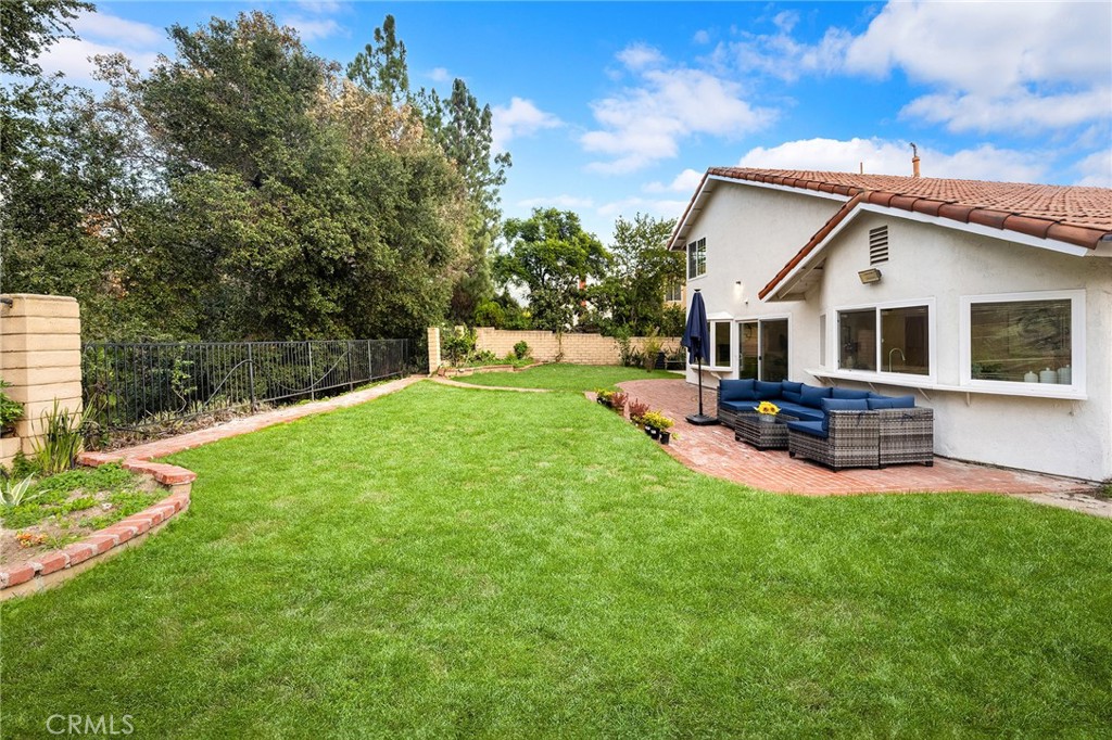 20329 Rim Ridge Road Walnut, CA 91789 - Photo 44 of 46 a house view with a sitting space and garden