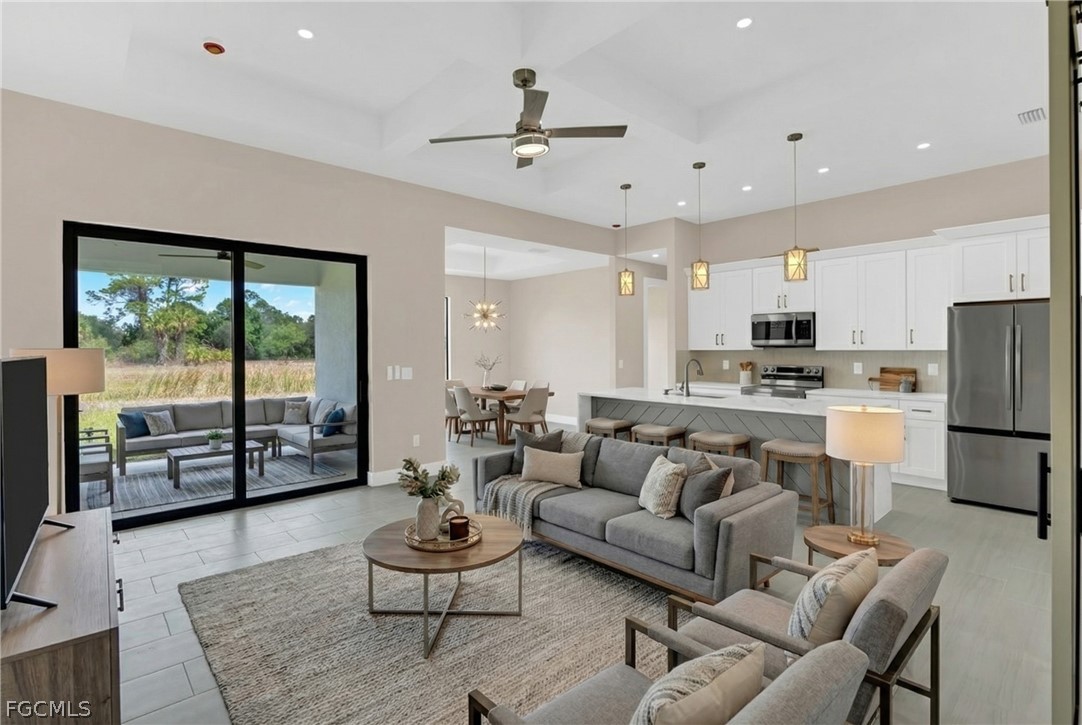 6029 Keystone Circle LaBelle, FL 33935 - Photo 8 of 50 a living room with furniture and a large window