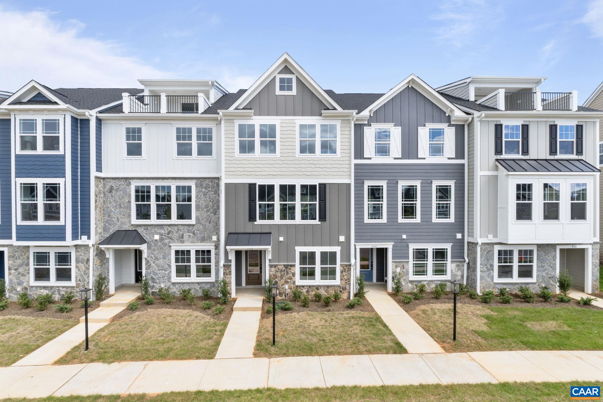 107 Park Ridge Drive Crozet, VA 22932 - Photo 1 of 42 a front view of residential houses with yard