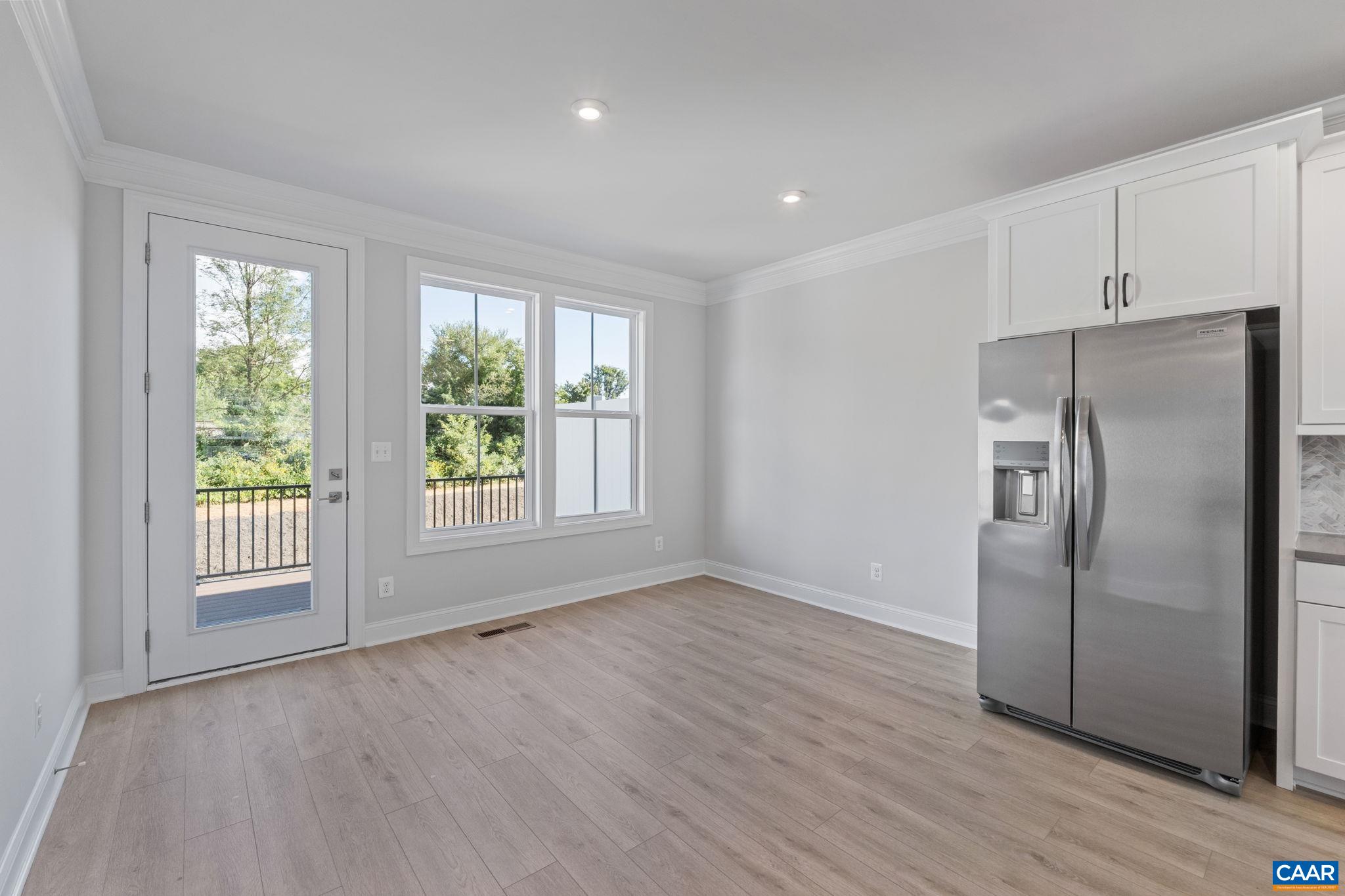 107 Park Ridge Drive Crozet, VA 22932 - Photo 17 of 42 a kitchen with stainless steel appliances a refrigerator sink and cabinets