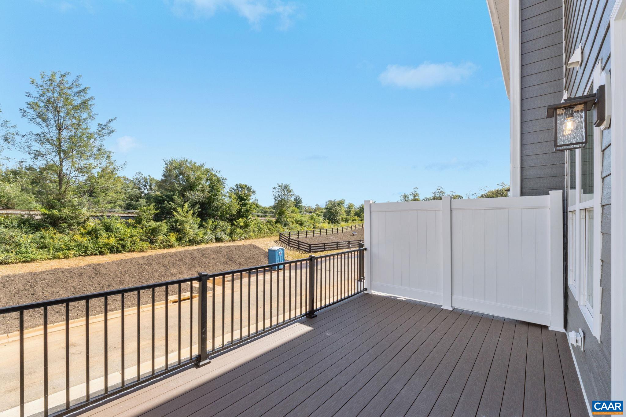107 Park Ridge Drive Crozet, VA 22932 - Photo 18 of 42 a view of a balcony with wooden fence