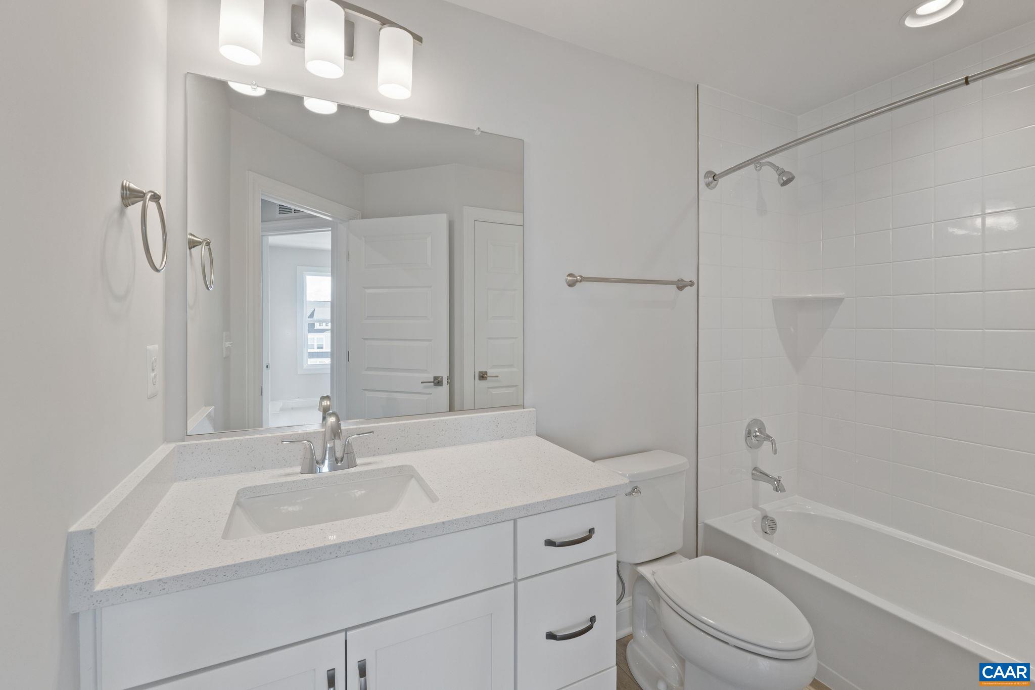 107 Park Ridge Drive Crozet, VA 22932 - Photo 34 of 42 a bathroom with a sink a toilet and shower