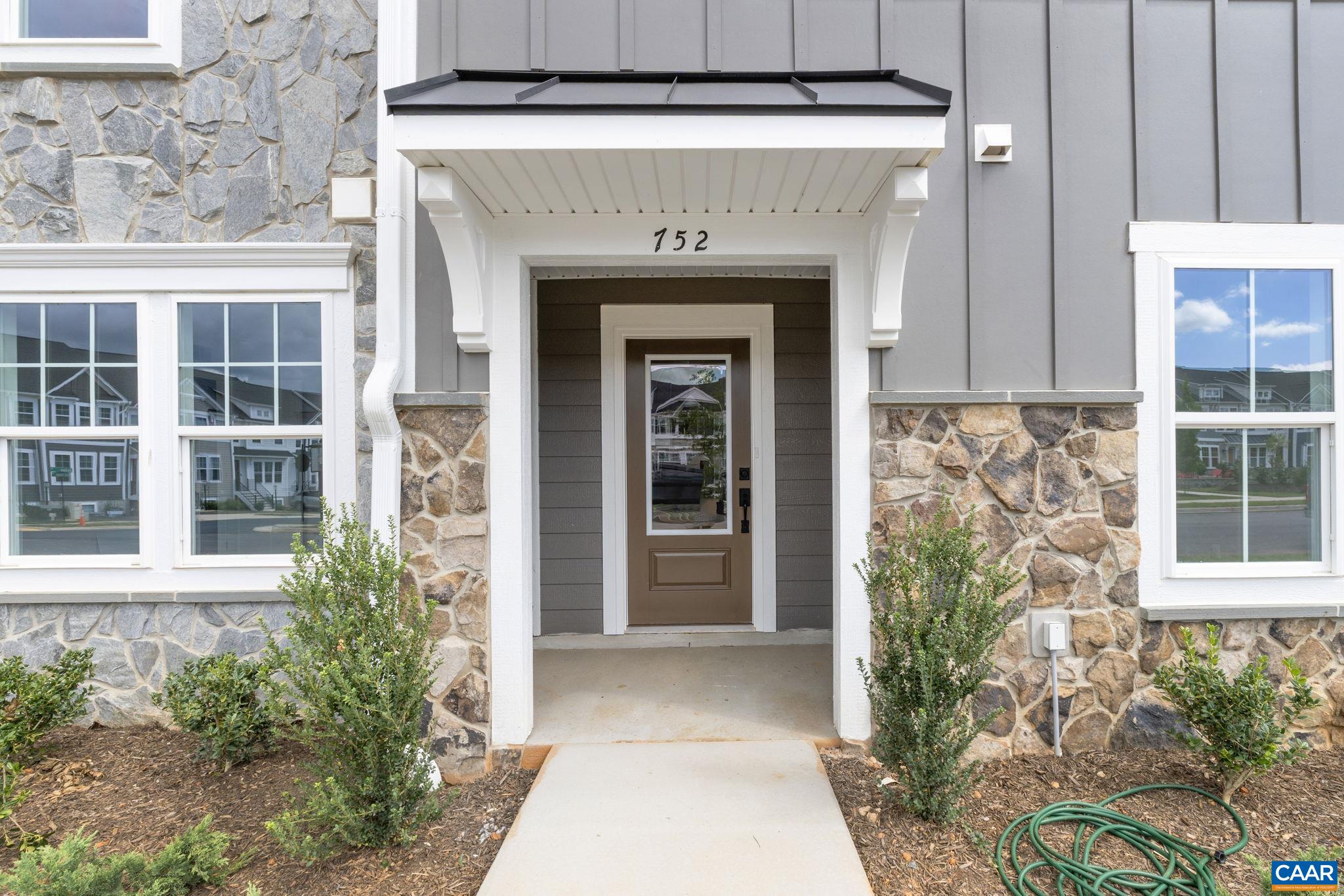 107 Park Ridge Drive Crozet, VA 22932 - Photo 4 of 42 a front view of a house with a yard