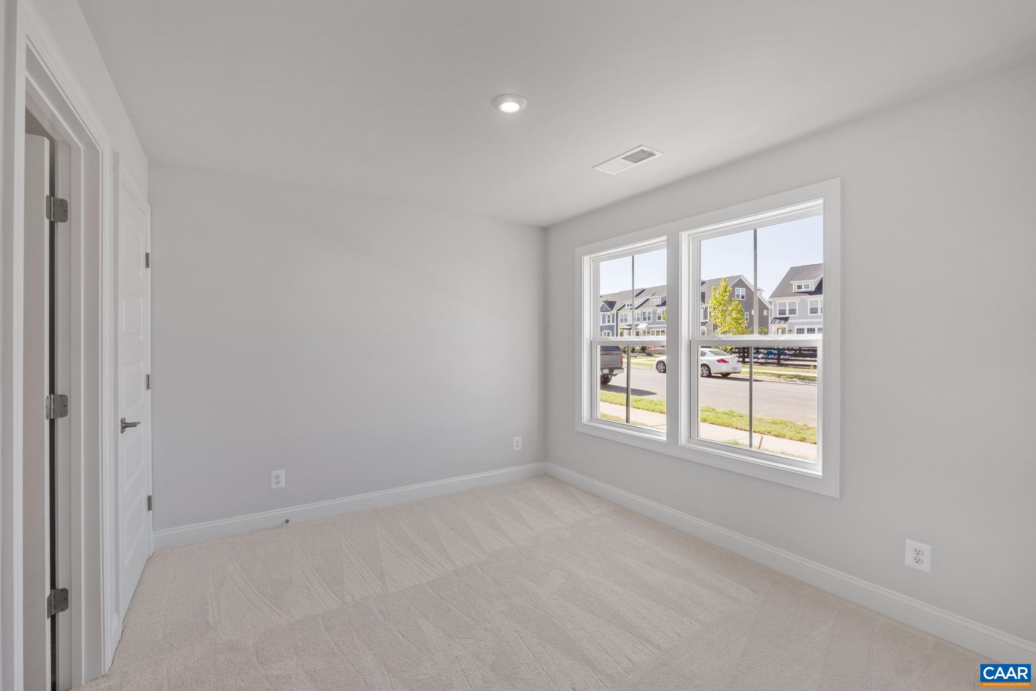 107 Park Ridge Drive Crozet, VA 22932 - Photo 7 of 42 a view of an empty room with a window