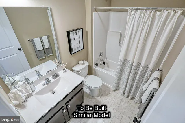 a view of a bathroom sink and a mirror