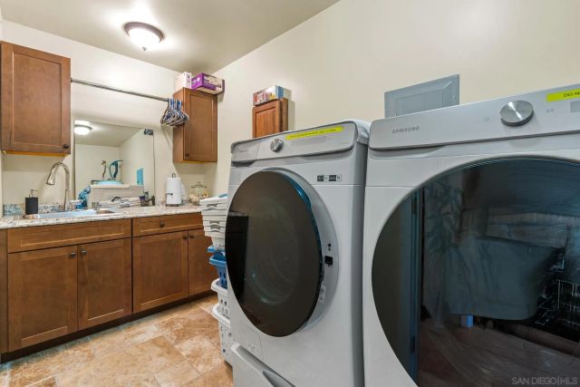 a view of a swimming pool with outdoor seating
